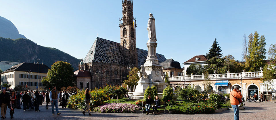 Piazza Walther square in the center of Bolzano with sight of the dome